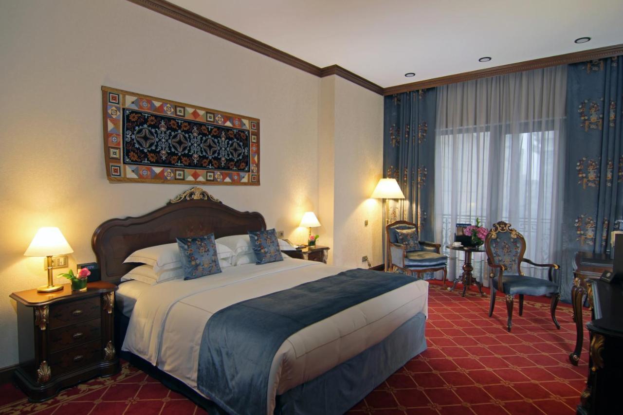 Orion Hotel Bishkek Exterior foto A room at the hotel